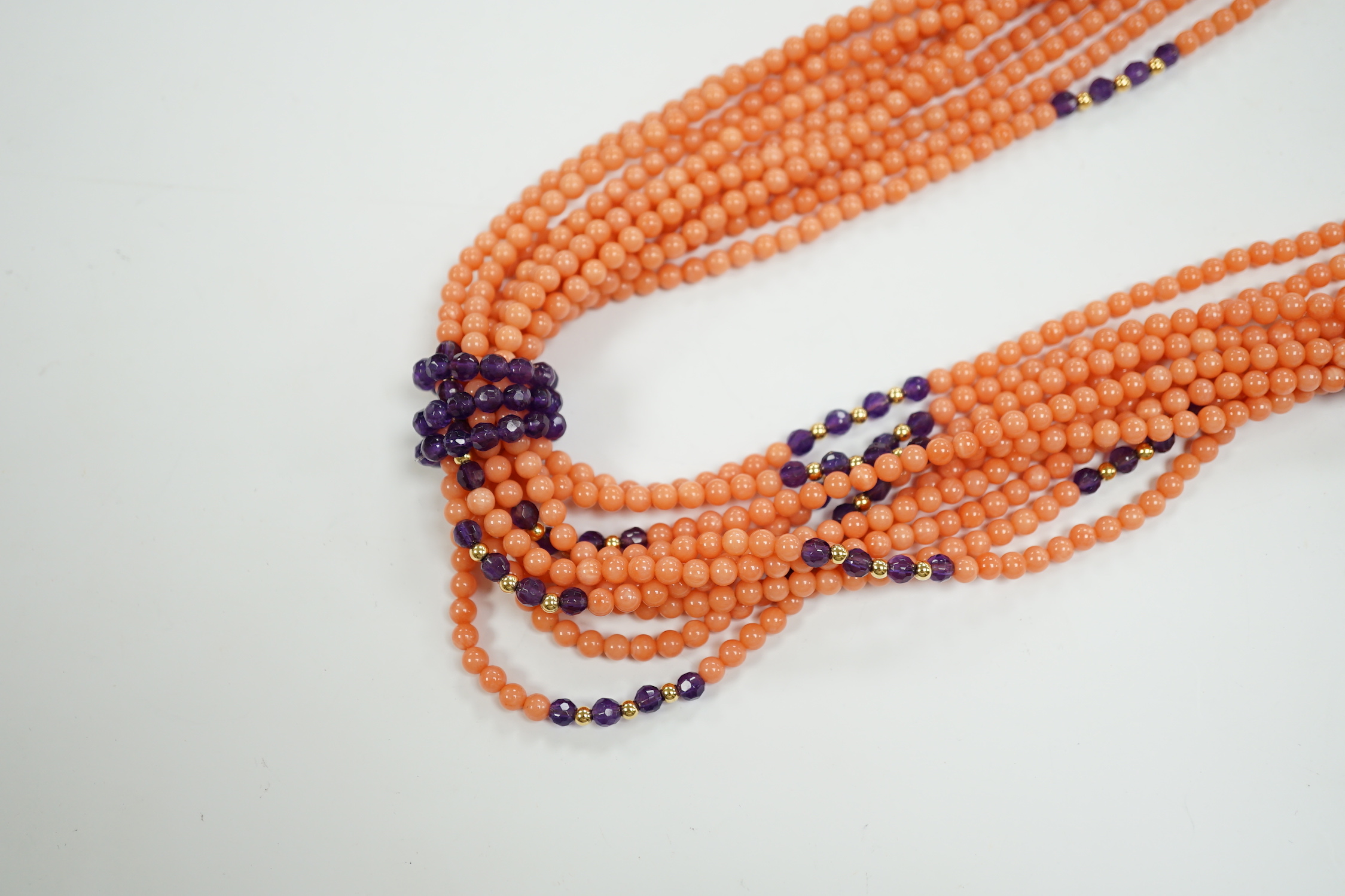 A recent coral, amethyst and yellow metal bead sautoire necklace, approx. 126cm.